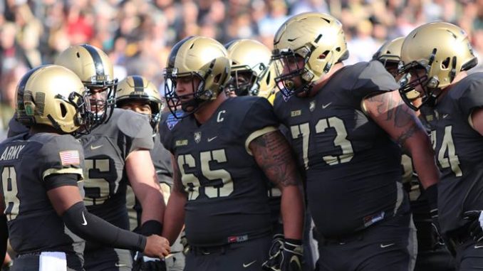 Army players huddle